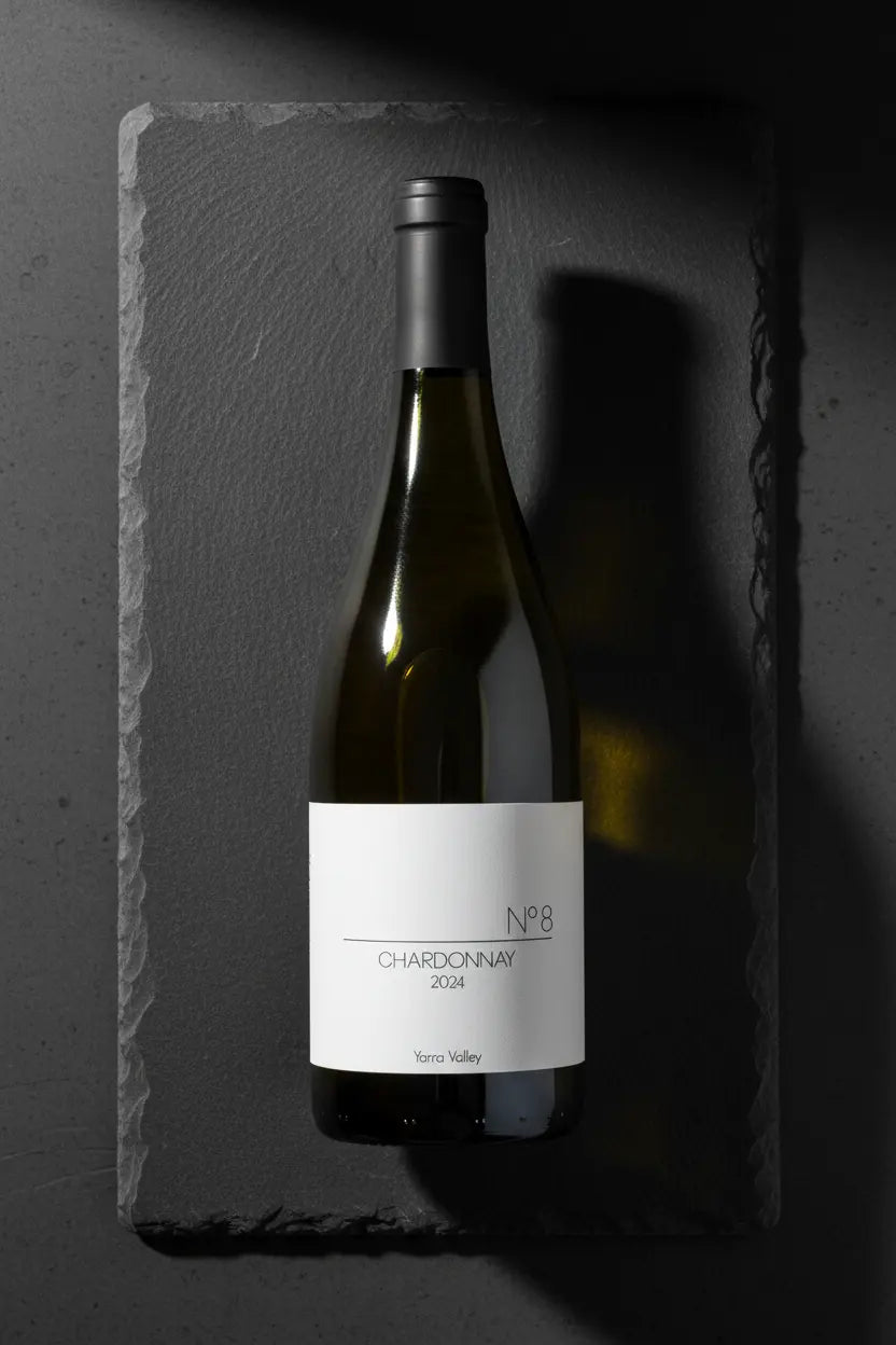 Seville Hill No 8 Chardonnay 2024 bottle from Yarra Valley on dark slate tile.