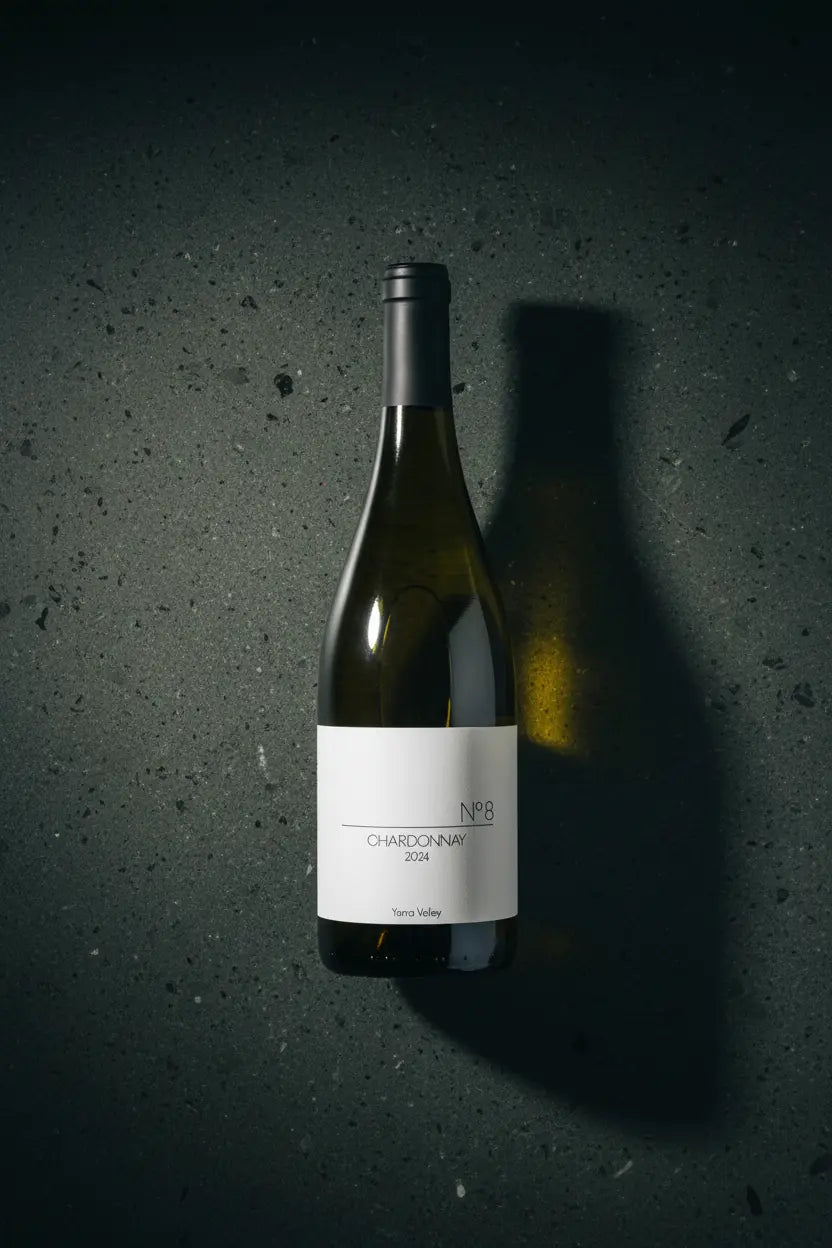 Seville Hill No 8 Chardonnay 2024 bottle on dark basalt stone surface, Yarra Valley